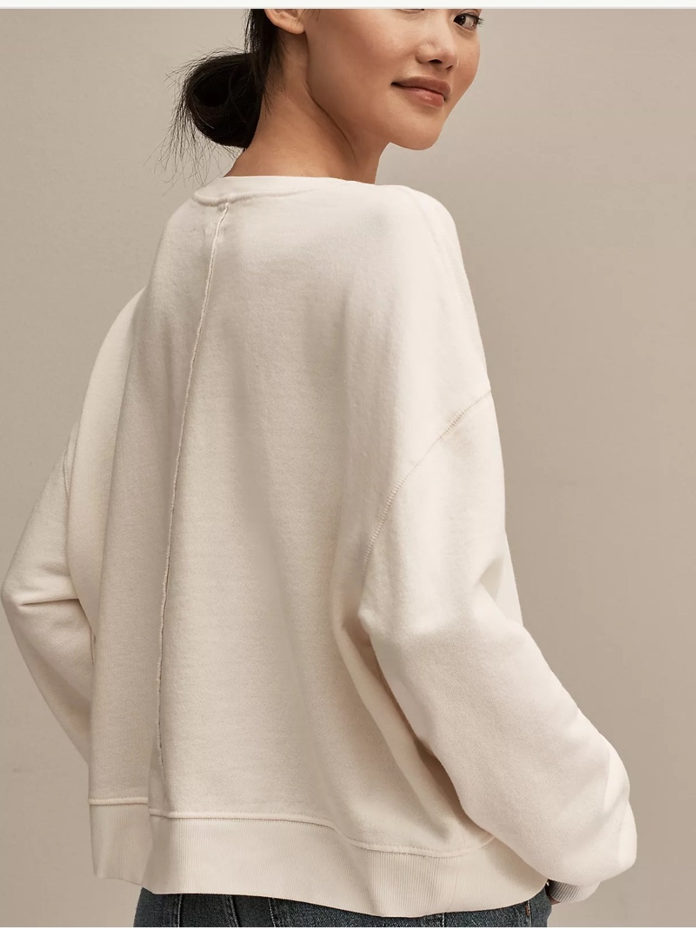 This cream Pilcro embroidered sweatshirt from Anthropologie features a "shimmer - Picture 2 of 12